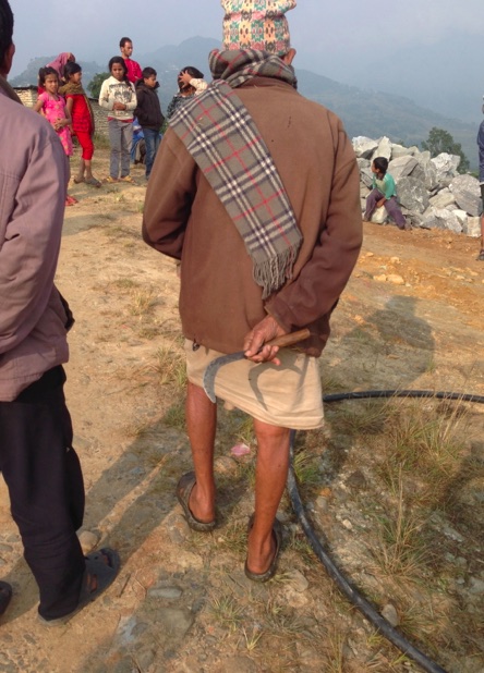 Nepali man and his sickle