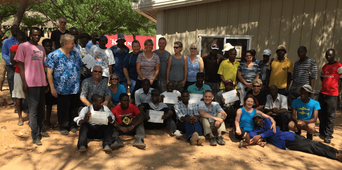 Group photo of all American week 6 volunteers and Zimbabwean volunteers and partners.