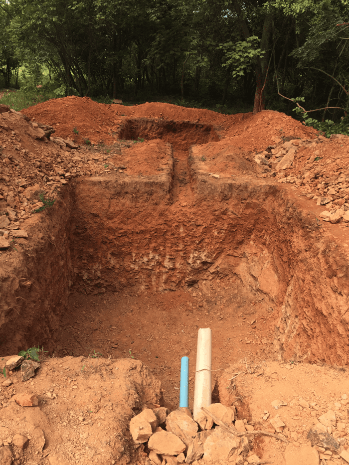 Hand-dug 10' deep septic pit