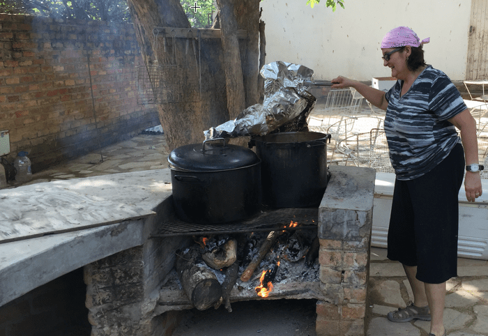 Chef Tamara prepares goat for the celebration feast